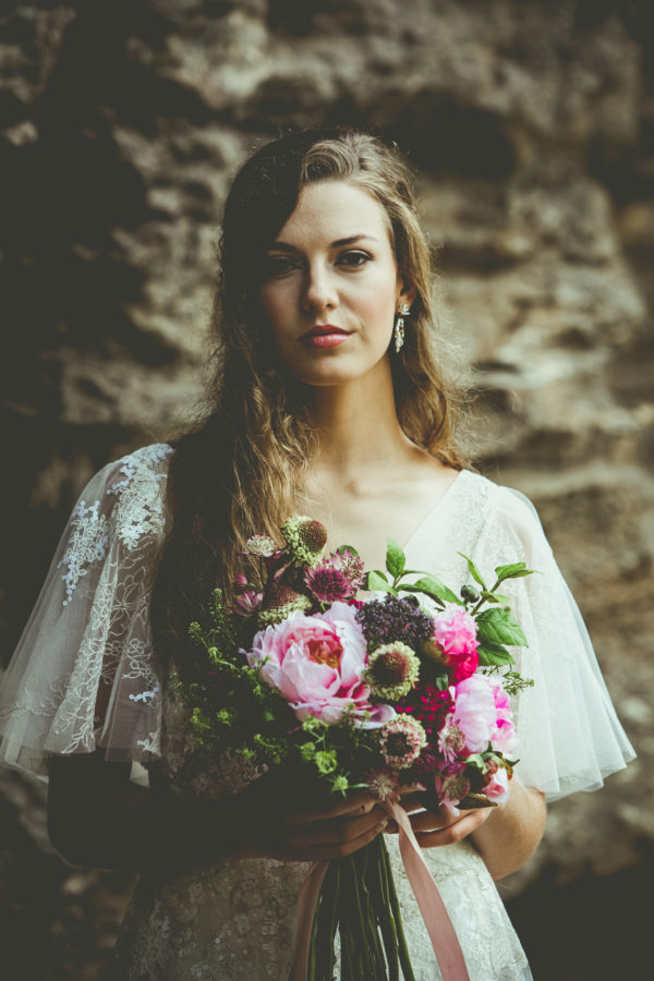 photographer michael allen at the top of the rock at big cedar lodge bridal editorial Southern Bride Magazine