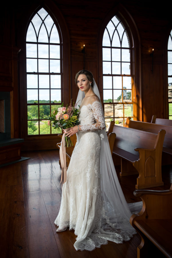 photographer michael allen at the top of the rock at big cedar lodge bridal editorial Southern Bride Magazine