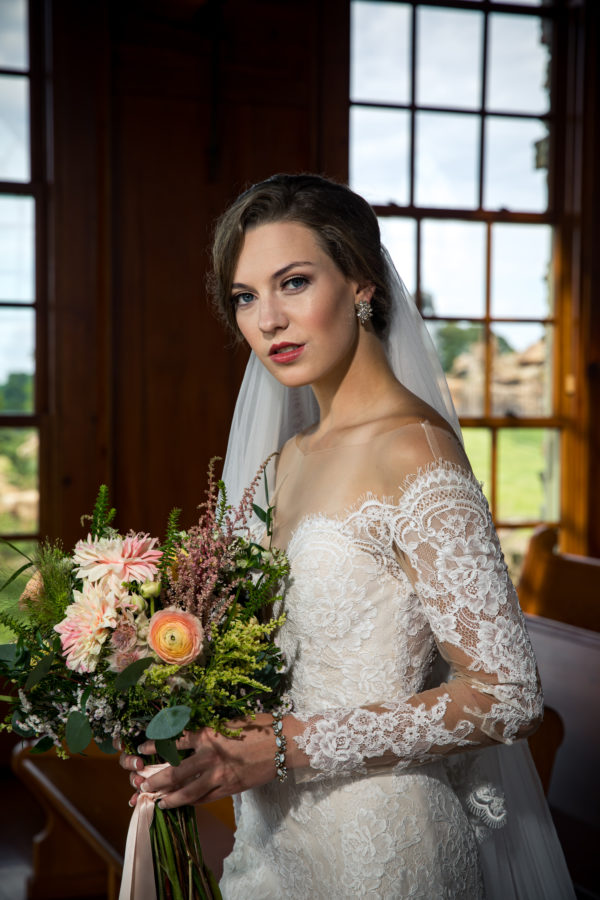 photographer michael allen at the top of the rock at big cedar lodge bridal editorial Southern Bride Magazine