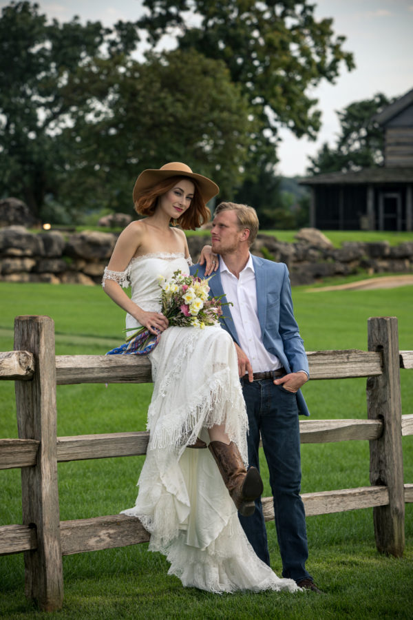 photographer michael allen at the top of the rock at big cedar lodge bridal editorial Southern Bride Magazine