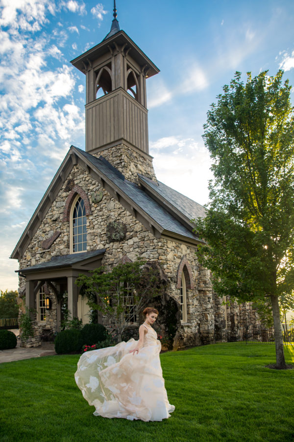 photographer michael allen at the top of the rock at big cedar lodge bridal editorial Southern Bride Magazine